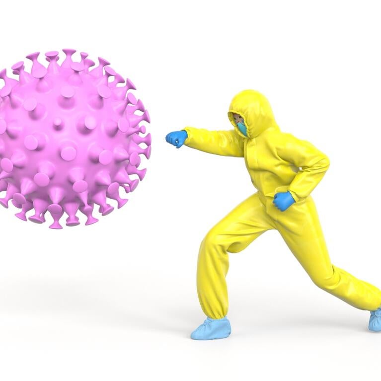 Man in hazmat suit fighting COVID